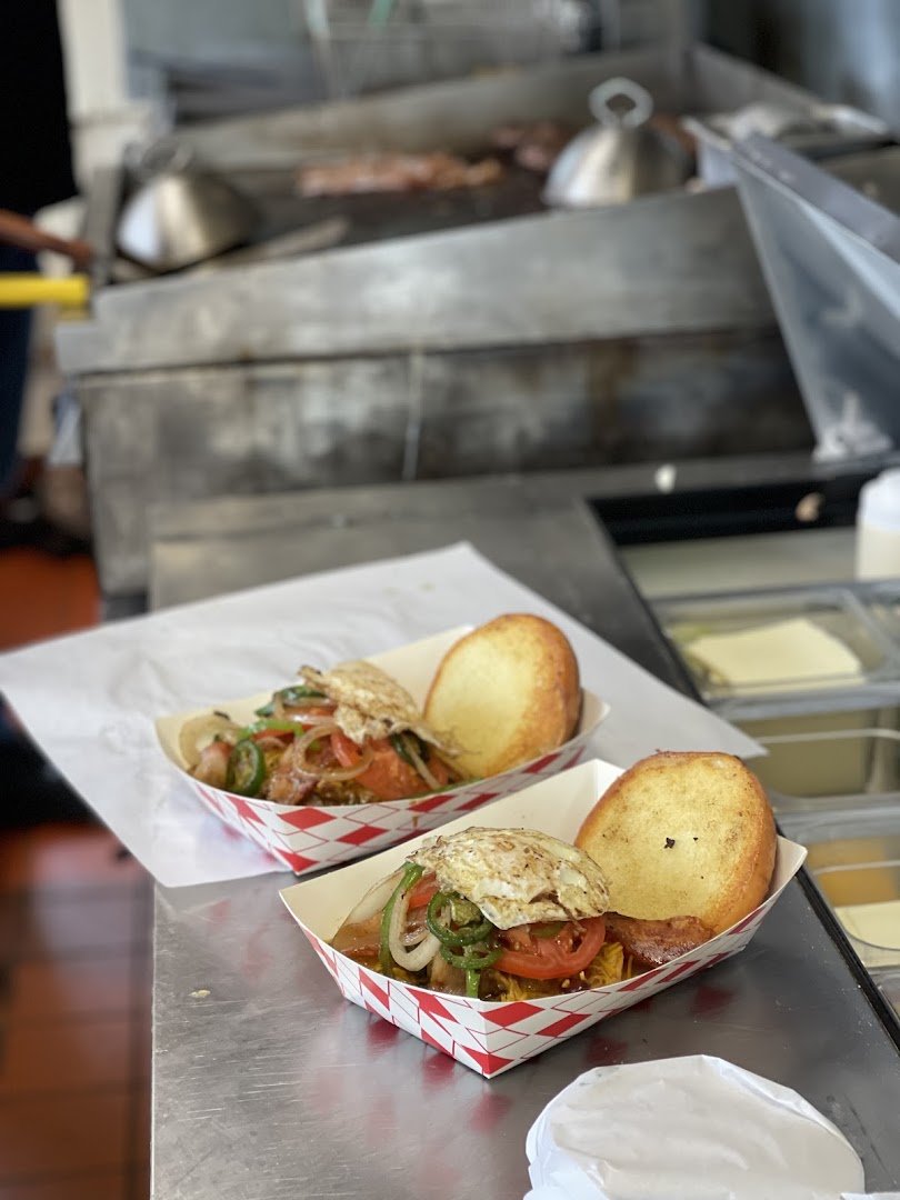 Burgers and fries served in a relaxed setting.
